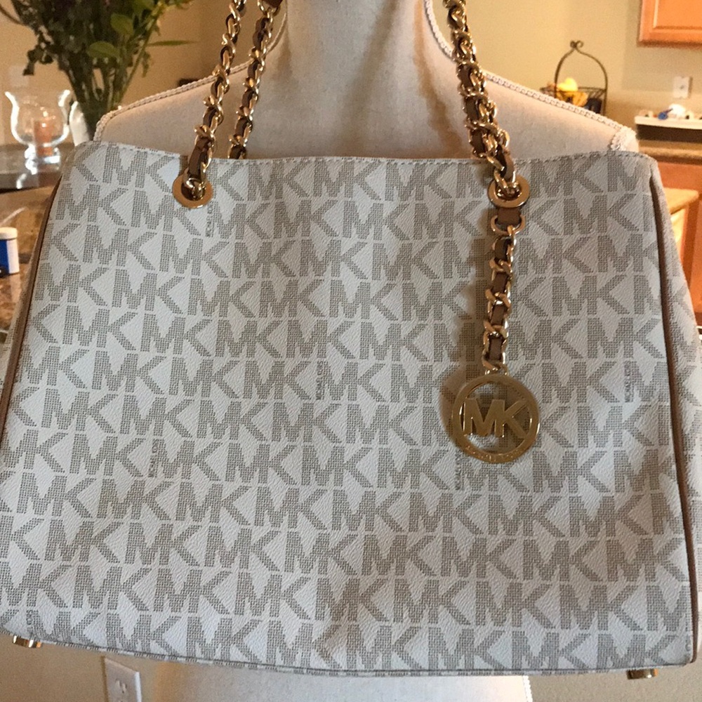 Michael Kors purse, matching wallet.
